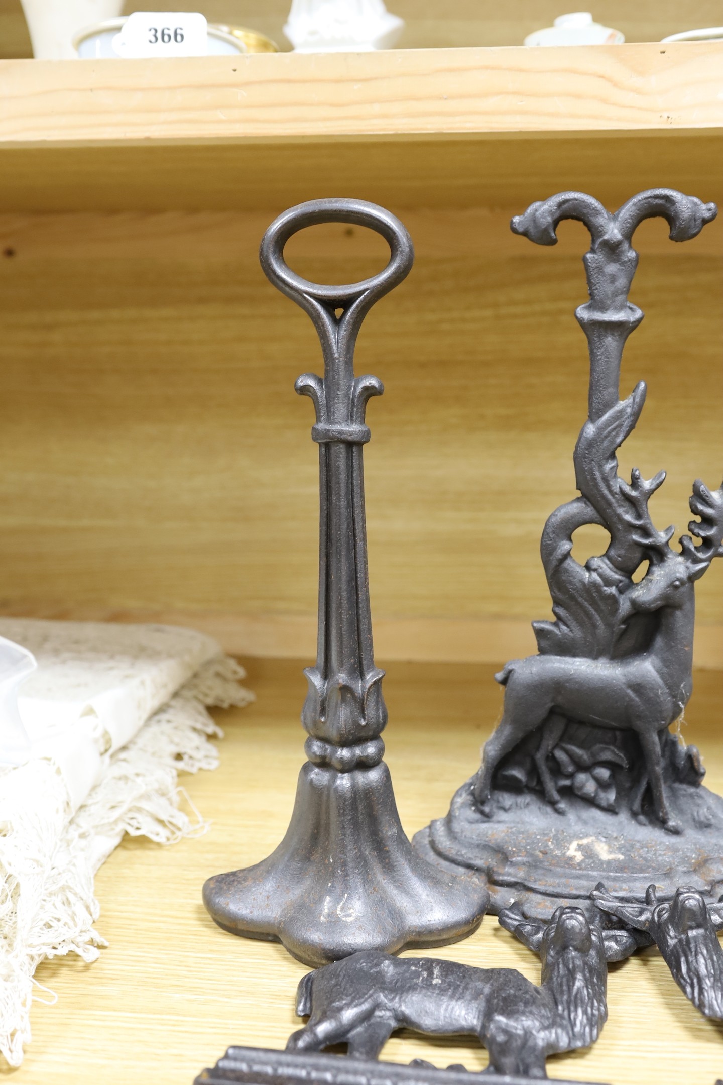 5 cast iron door stops, three of deer, tallest 39.5 cms high